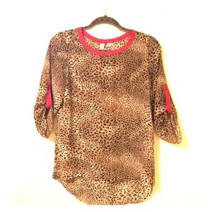 Cheetah print blouse with pink borders